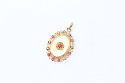 null 18k (750) yellow gold oval openwork pendant with round synthetic rubies. 

Top....