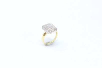 null 18k (750) yellow and white gold octagonal ring paved with brilliants. 

Finger...