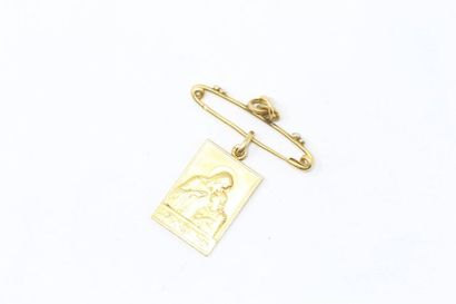 null Lot of 18k (750) yellow gold including a rectangular religious medal and an...