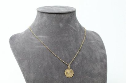 null Chain with chain link and religious medal in 18k (750) yellow gold. 

Neck size:...