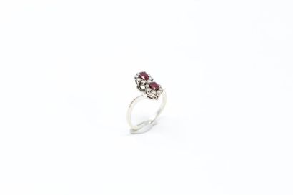 null 18k (750) white gold Toi&Moi ring set with two oval rubies surrounded by brilliants.

Finger...