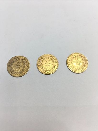 null Trois pièces en or de 20 francs Napoléon III tête nue (1858 A ; 1859 A x 2)
Poids...