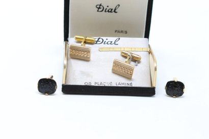 null Two pairs of golden metal cufflinks. 

One of them in a box. 