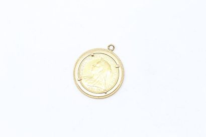 null 18k (750) yellow gold pendant holding a Victoria gold sovereign - Saint George...