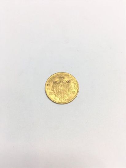 null Pièce en or de 20 francs Napolèon III tête laurée (1864 A)
Poids : 6.45 g. 