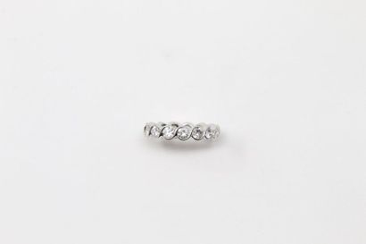 null American wedding band in platinum (950) decorated with 15 diamonds.

Total weight...