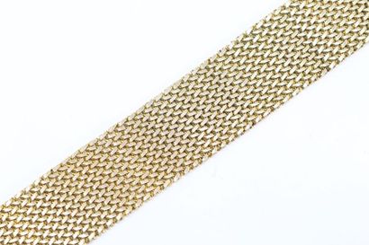 null 18k (750) yellow gold belt bracelet. 

Weight : 84.38 g. 
