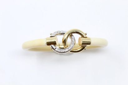 null Rigid opening bracelet made of a bone band, cut in its upper part by two interlocking...