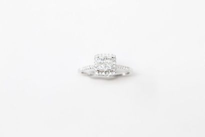 null Square 14K (585) white gold alloy ring set with four princess cut diamonds,...