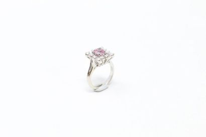 null 18k (750) white gold ring set with a cushion pink spinel in a setting of brilliants....