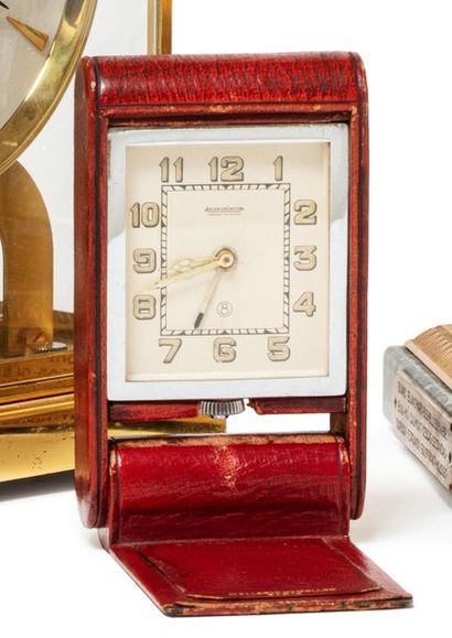 JAEGER LECOULTRE JAEGER LECOULTRE 

Clic clac" clock with alarm function. 

Burgundy...