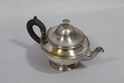null CHRISTOFLE teapot in silver plated metal on beaded heel. Scroll handle in blackened...
