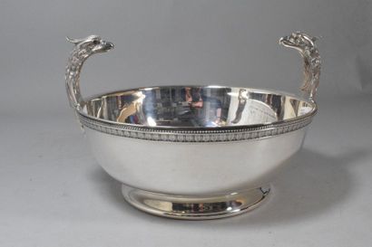 null Cup with eagle heads on each side in silver plated metal. 

Goldsmith : Christofle....