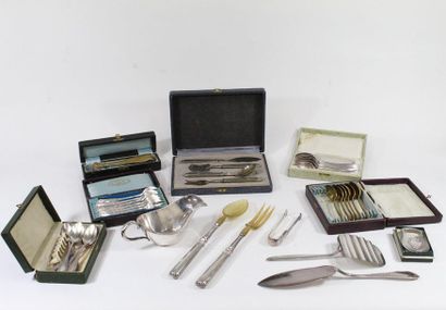 null Lot of silver plated metal composed of spoons, sauceboat, serving pieces, etc......