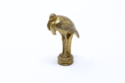null Seal to be sealed, gilt bronze grip (wear) showing a wader, blind round die.



Ht....