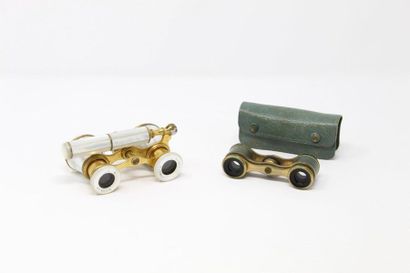null Reunion of two pairs of gilded metal theatre binoculars, one of which has a...