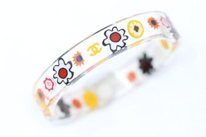 CHANEL CHANEL 

Bracelet transparent plexiglass rush with multicolored stylized flowers...