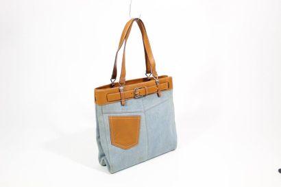 DIOR DIOR 

Bag model "Denim pocket" in blue denim and brown leather, bag size.

Size:...