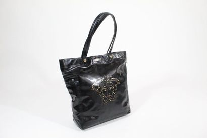 VERSACE VERSACE 

Large bag in black glazed leather with the figure of the jellyfish...