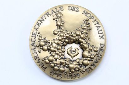 null Florentine bronze medal.

Obverse: PHARMACIE CENTRALE DES HOPITAUX DE PARIS...