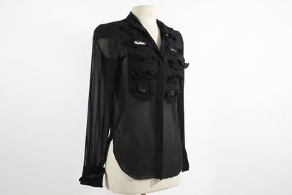 Yves Saint LAURENT YVES SAINT LAURENT Left Bank

Black openwork blouse with flowers...