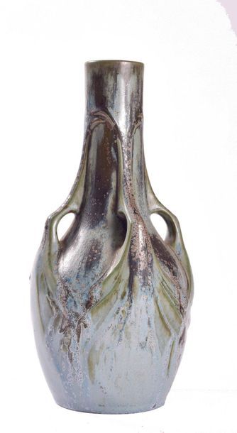 null DENBAC

Vase en grès à col tubulaire et base ovoïde à quatre

anses détachées...