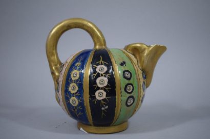 null Ewer with a high spherical rumen on a recessed pedestal.

Polychrome ceramic...
