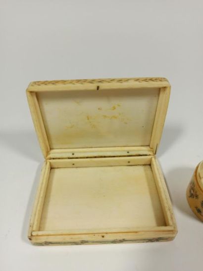 null Set consisting of a rectangular snuffbox and an ivory pill box painted with...