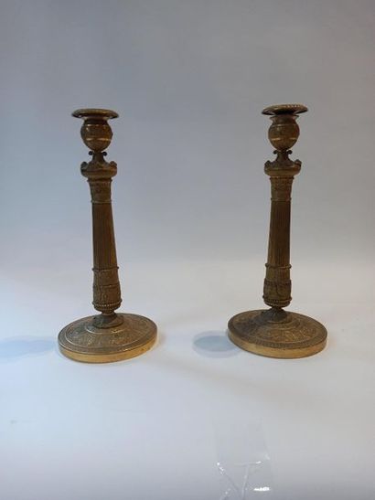 null Pair of gilt bronze torches with relief decoration of winged victories, garlands...