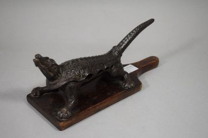 null Cast iron pharmacist's cork with a crocodile. Numbered 3619.

Presented on a...