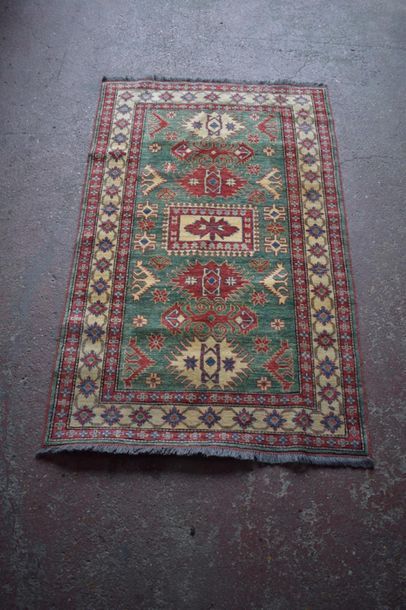 null Kazak carpet (South Caucasian), circa 1985.

Dimensions. 200 x 125 cm

Technical...
