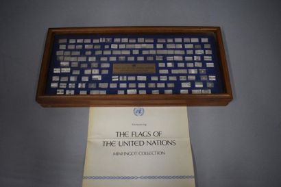 Box with a set of 142 United Nations flags,...