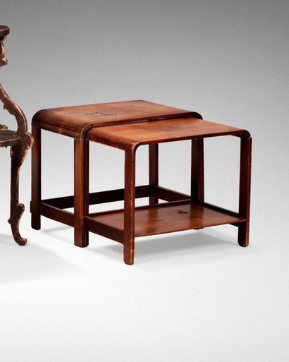 null MAJORELLE FRERES & CIE

Nesting table, c. 1925, in rosewood veneer with an upturned...