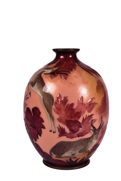 null Camille FAURE (1874-1956)

Copper vase with an ovoid shouldered body and small...