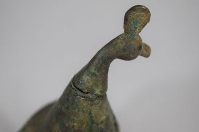 null MIDDLE EAST: 

Zoomorphic bronze lamp or ewer element with a peacock, Height:...