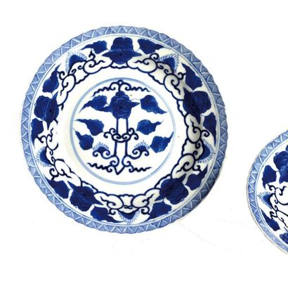 null CHINA, 19th century

Pair of porcelain plates decorated in blue with stylized...