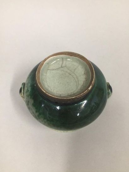 null CHINA, 20th century

Perfume burner in porcelain with green glaze, flanked by...