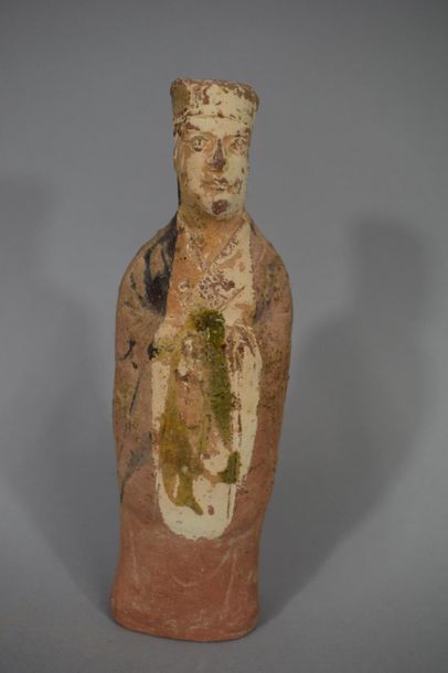 null CHINA

Terracotta dignitary with polychrome engobe remains.

Restorations

H....