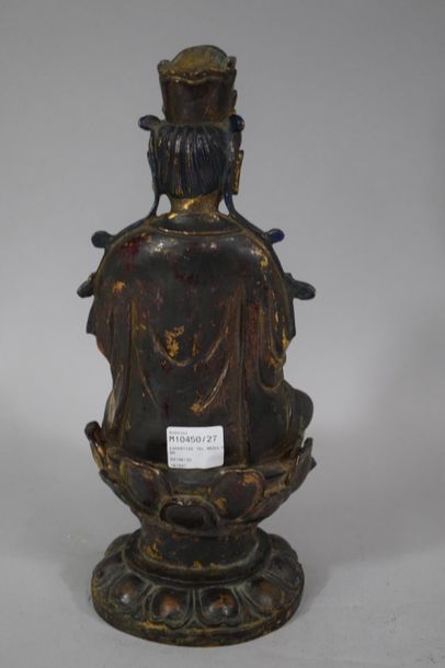 null CHINE, XXème siècle

Statuette de Guanyin dans le style des Ming, en bronze...