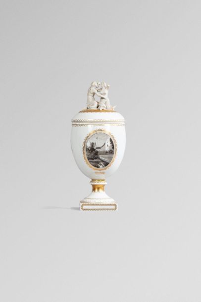 null COVERED HARD CHINA VASE.

Of ovoid shape, resting on a square base, decorated...
