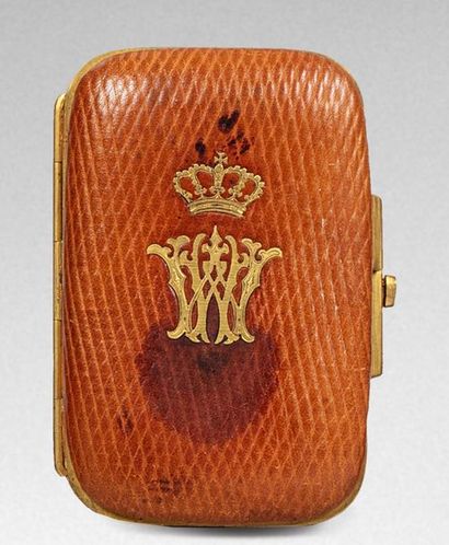 null CURRENCY HOLDER.

Rectangular in shape, rounded at the corners, made of tobacco-coloured...