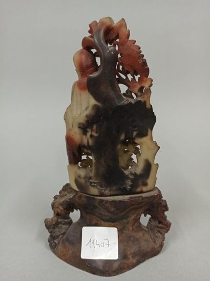 null CHINA - Around 1900

Suite of two soapstone sculptures representing a wise man...