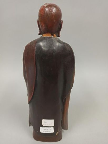 null Dignitary standing in lacquered wood 

japan