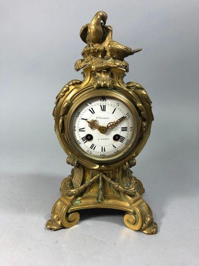 null Bronze clock in the Louis XVI style and symbolizing love, dial signed Crosnier...