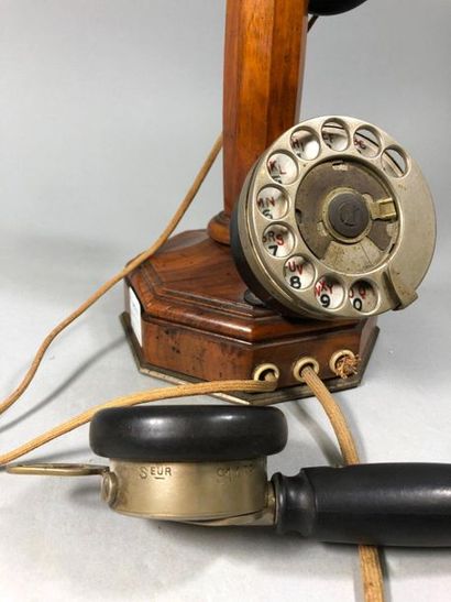 null Wooden telephone at the octagonal base of the Franco-American house, 10 rue...