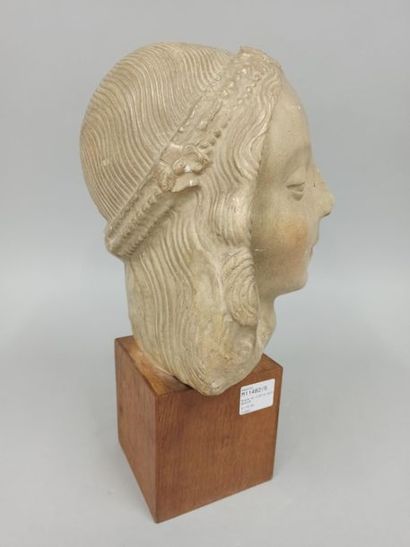 null Bust in patinated plaster depicting a young woman's head with a medieval headdress,...