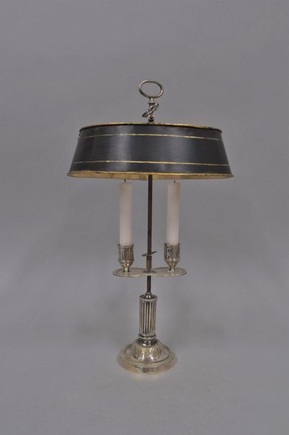 null Two-burner hot-water bottle lamp, in partially silvered bronze, the fluted shaft...