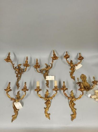 null Three pairs of Louis XV style gilt bronze two-armed sconces and a small two-armed...