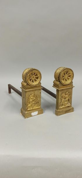 null Pair of ormolu and chiselled bronze chenets decorated with winter and summer...