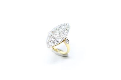 null Marquise ring in 18K (750) yellow gold and platinum, the bezel paved with cushions...